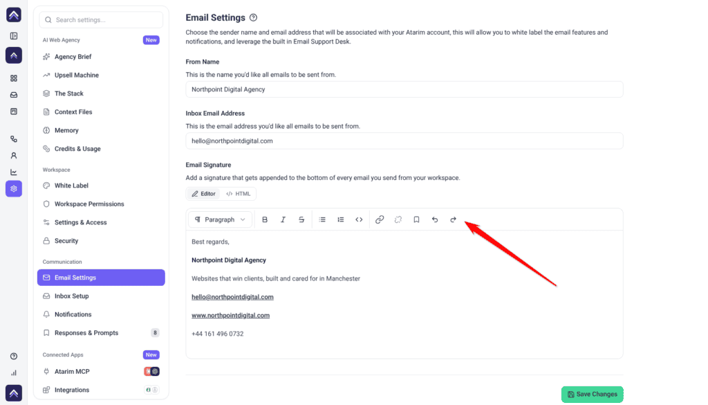 Email Signature editor in Email Settings with a sample signature and Editor and HTML tabs, arrow on the formatting toolbar